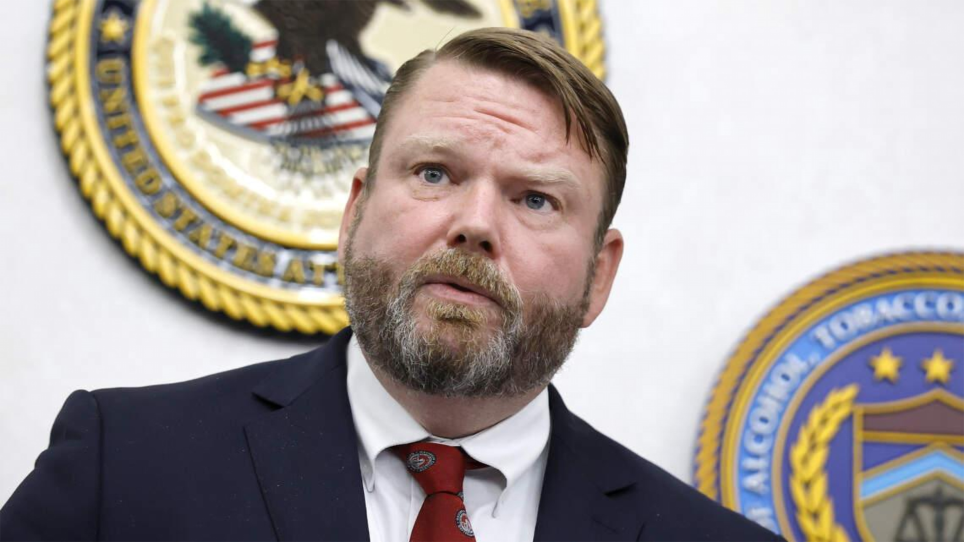 U.S. Attorney W. Ellis Boyle speaking at an economic crimes summit in Raleigh, North Carolina.